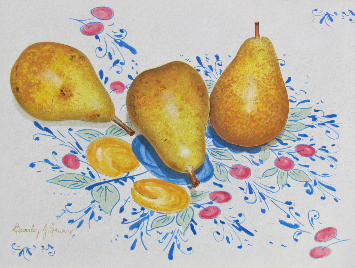 Three golden pairs on plate with folk art